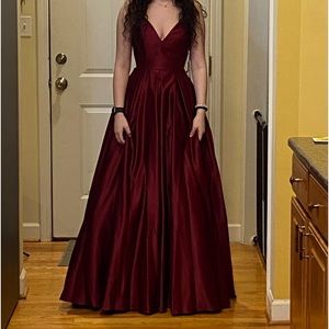 Blondie nites dark red prom dress. Lace up back, adjustable straps